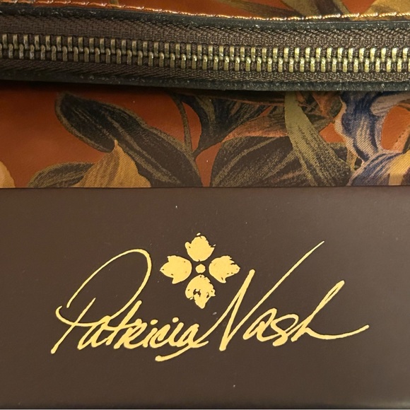 Brand New Patricia Nash fold over leather wristlet (still in & attached to box)